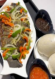Delicately grilled tilapia fish served with cooked vegetables & ginger sauce.